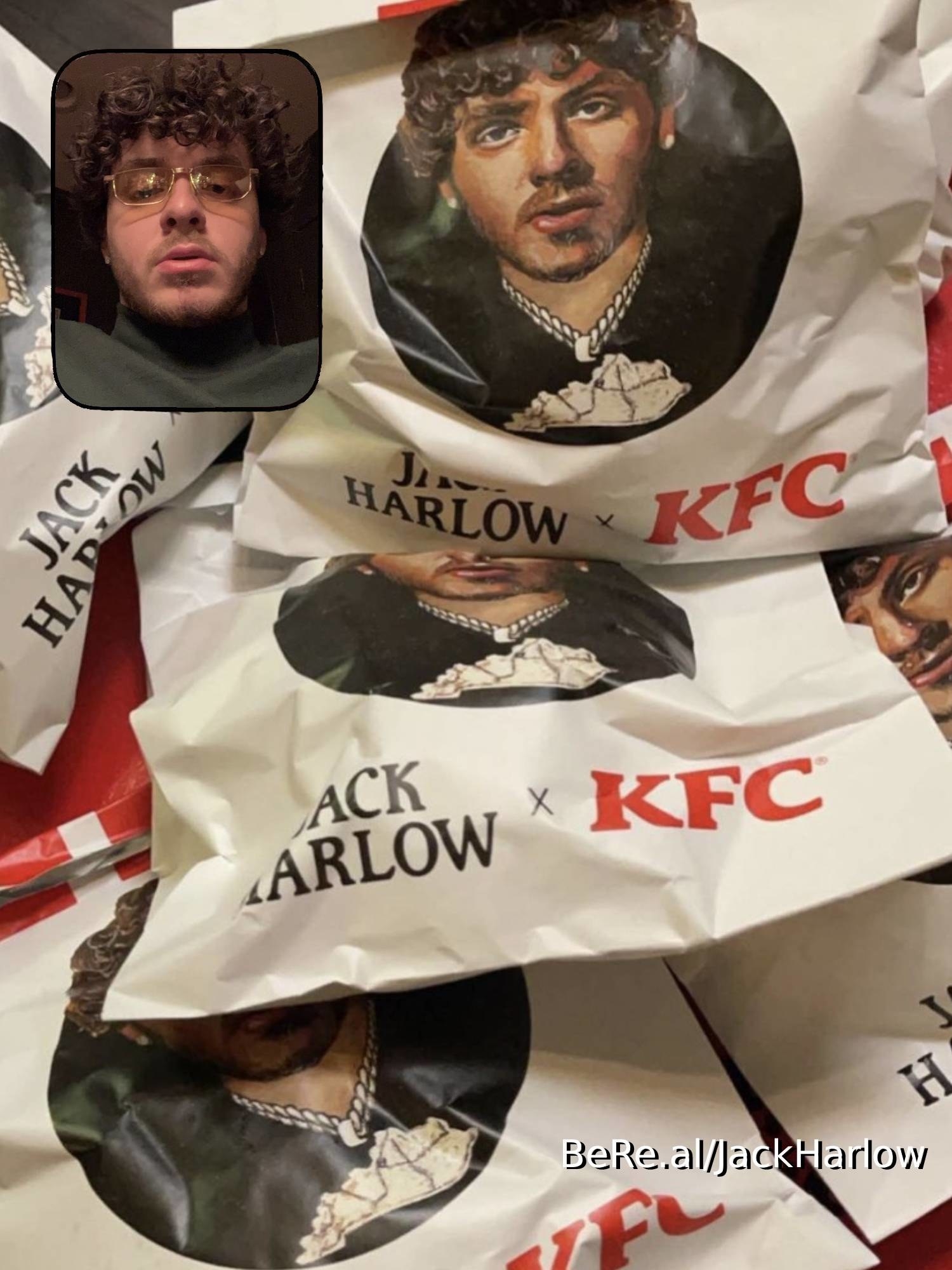 Jack Harlow with a pile of Jack Harlow KFC meals