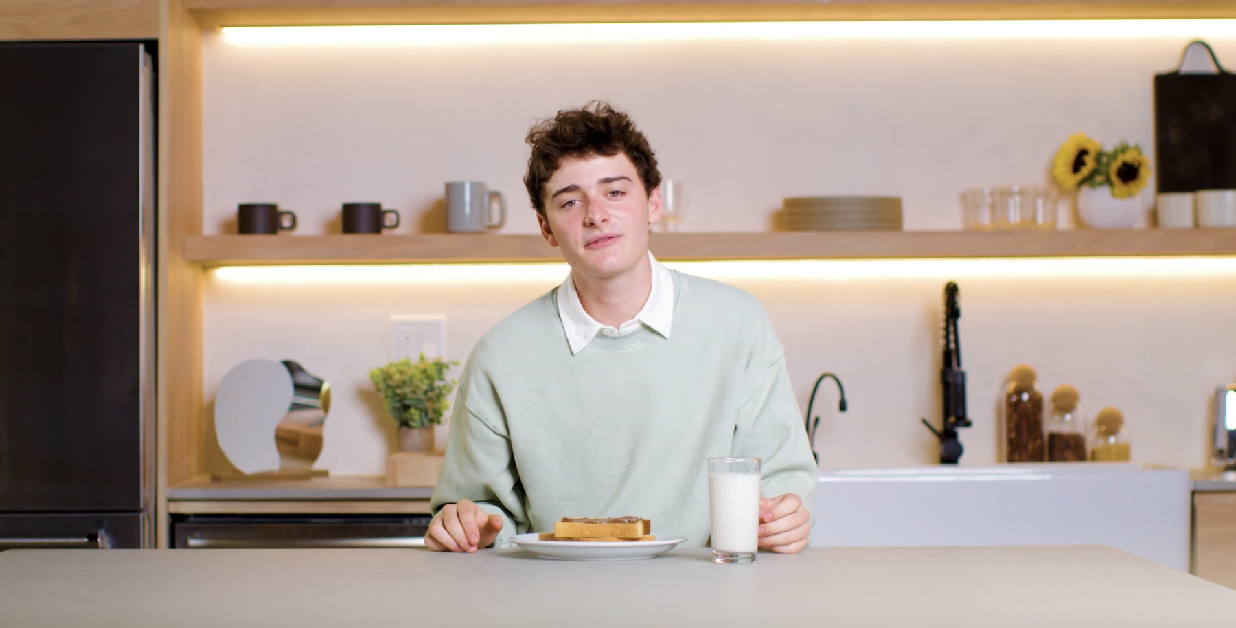 noah eating his TBH spread on toast