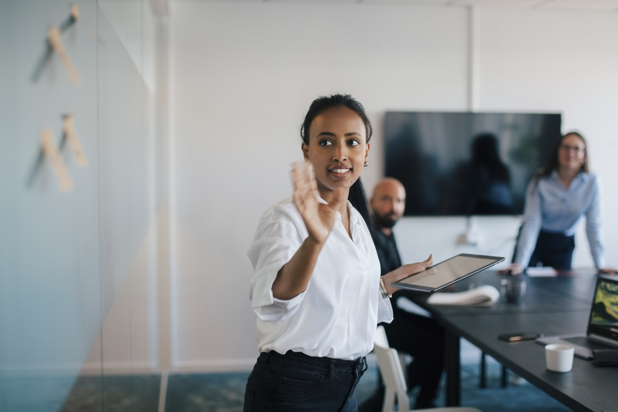 a woman giving a presentation