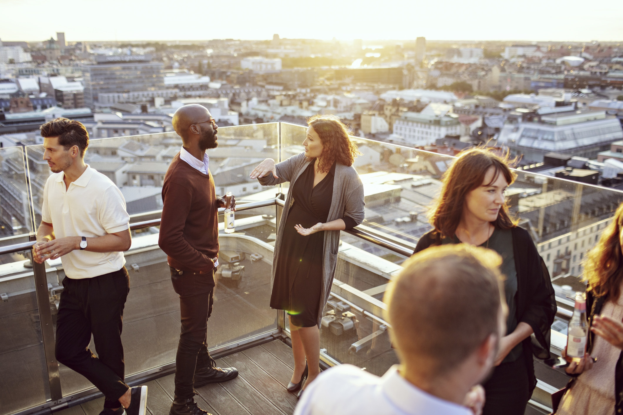 People networking on a rooftop