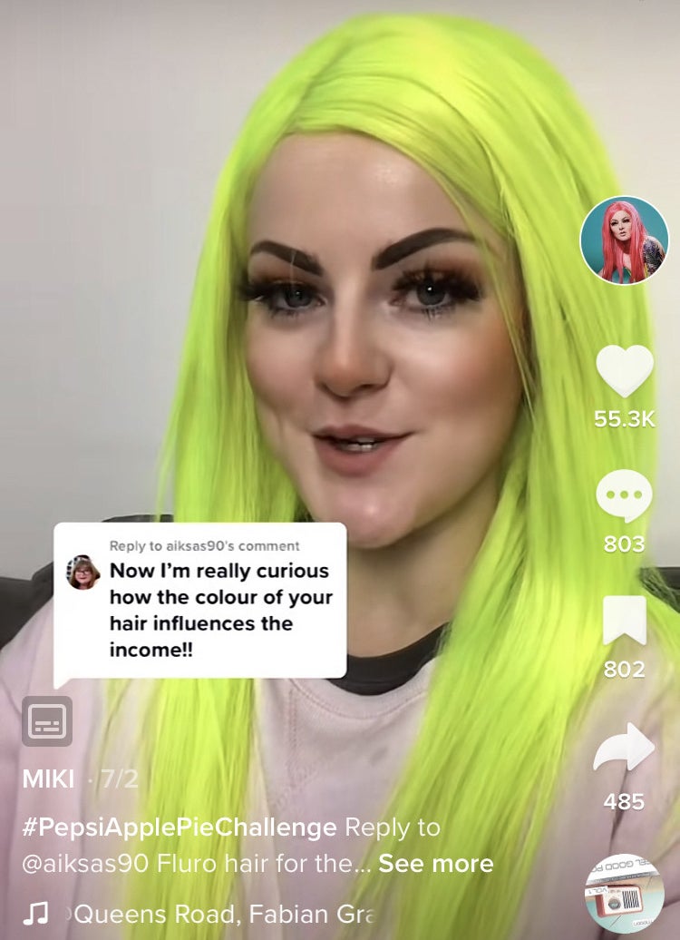 Miki wearing her fluorescent wig