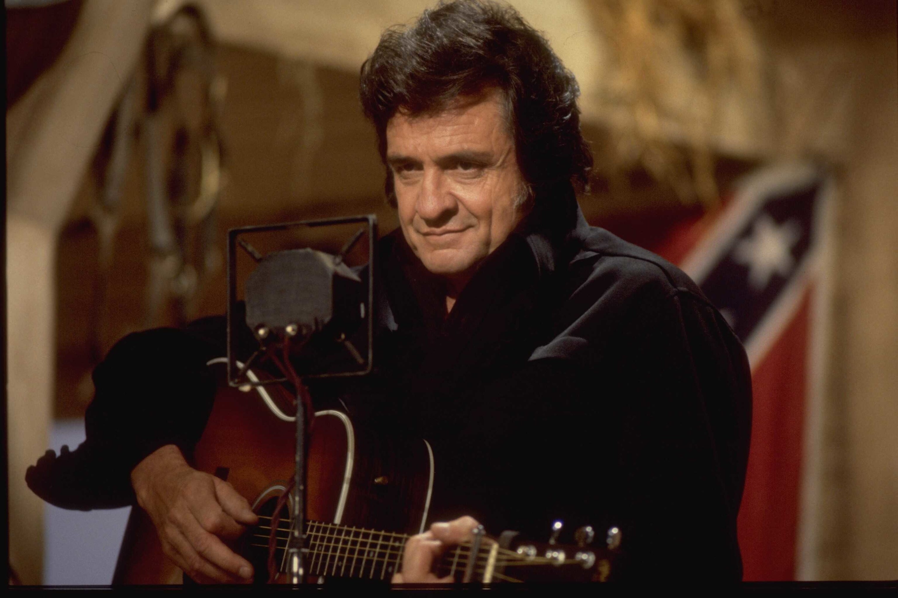 Johnny Cash playing guitar