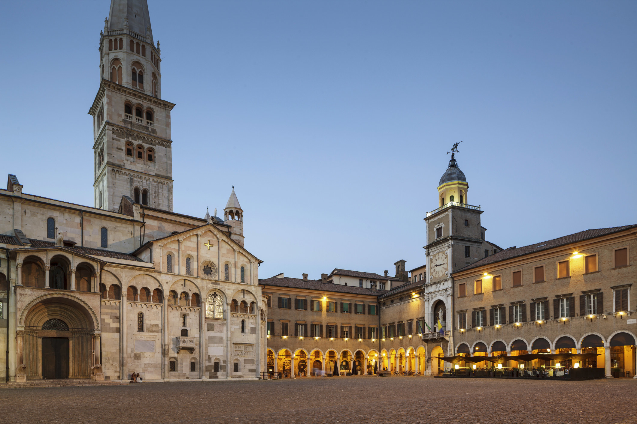 A cathedral and a town square in an Italian city
