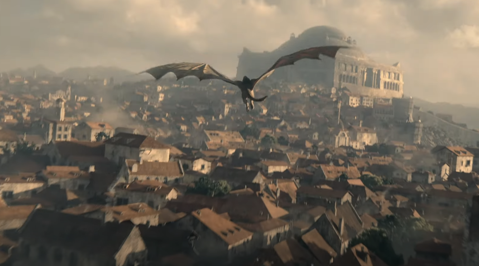 A dragon flies over a large, densely populated city