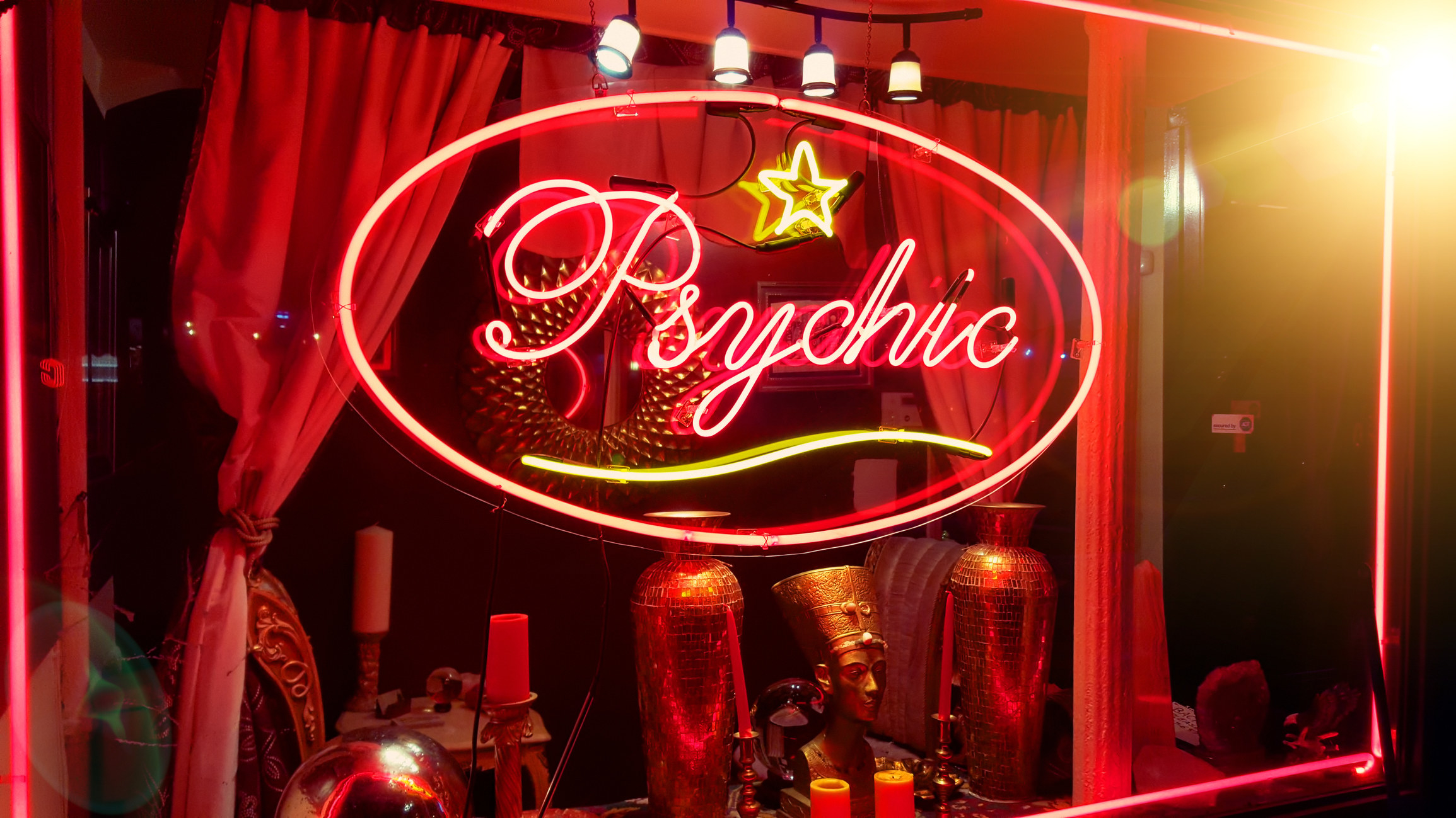 A lit-up sign of a psychic