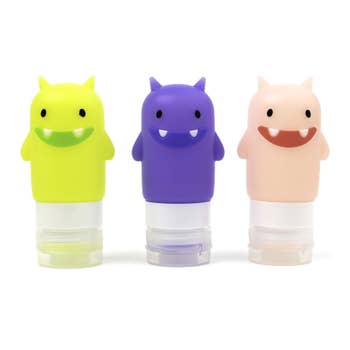 Three colorful monster condiment squeeze bottles
