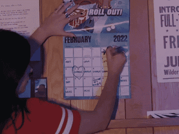 woman marking a calendar