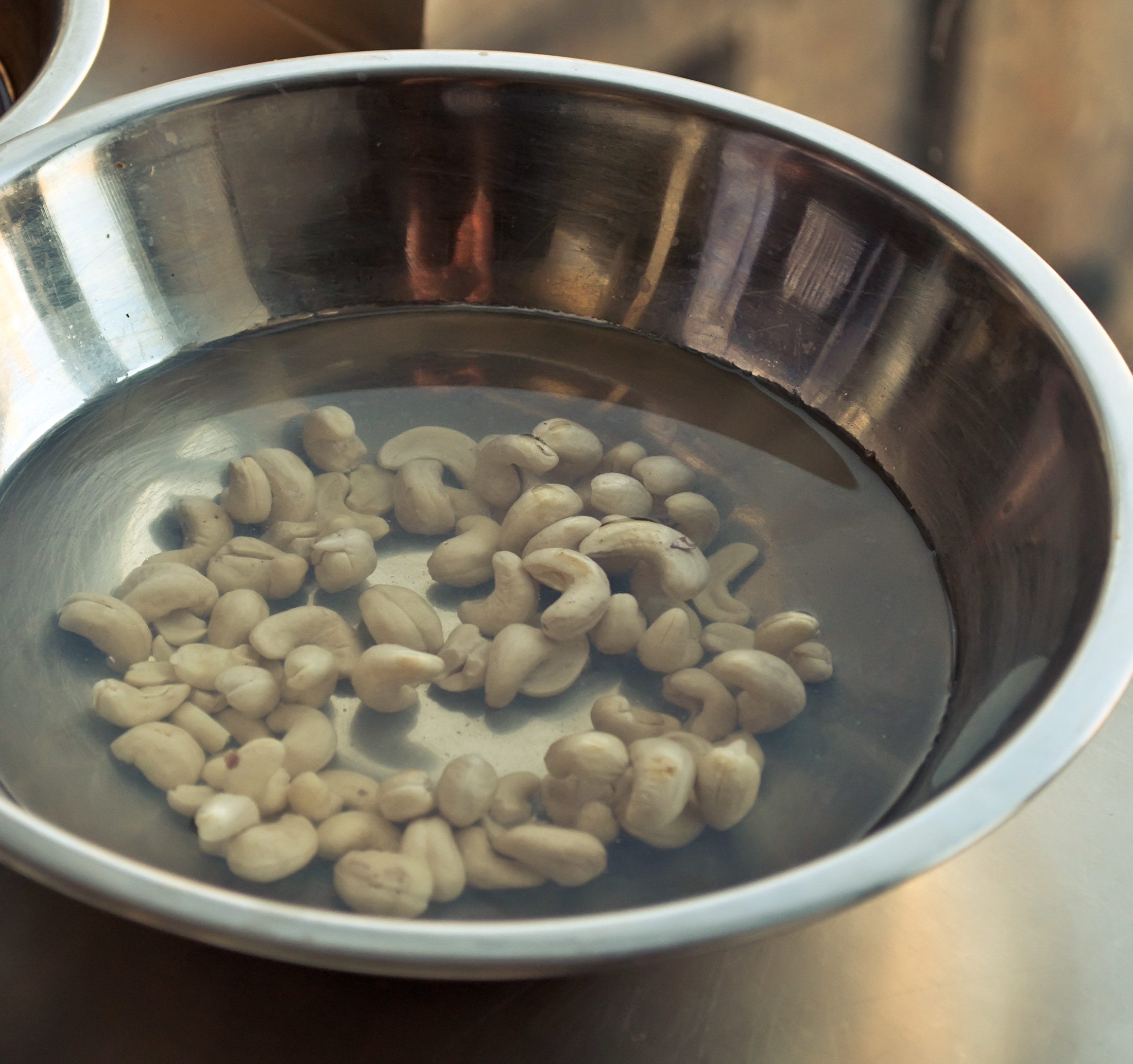 Soaking cashews in a bowl.