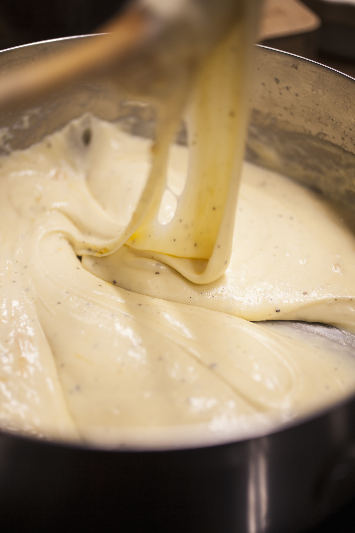 Cooking a cheese sauce.