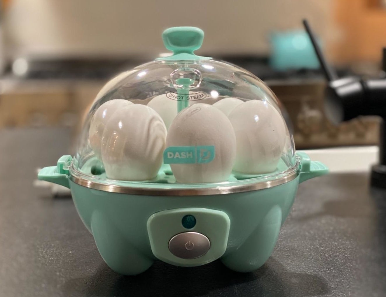 a reviewer photo of the dash egg cooker filled with eggs