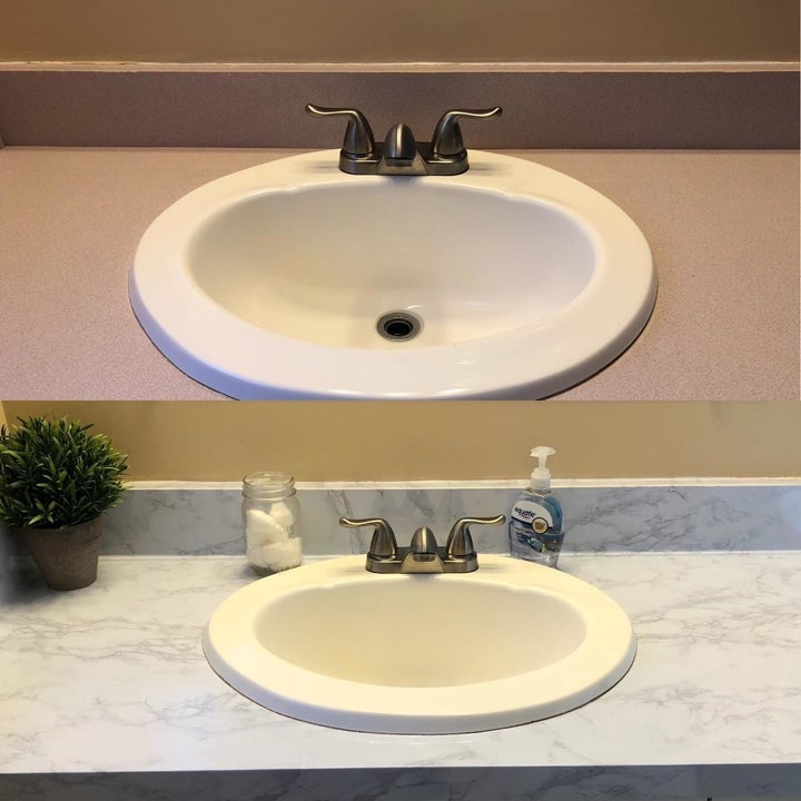 before and after reviewer images of a beige bathroom sink countertop being covered with marble contact paper