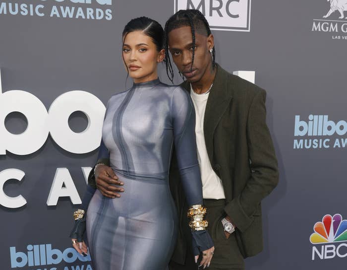 Kylie and Travis posing on the red carpet