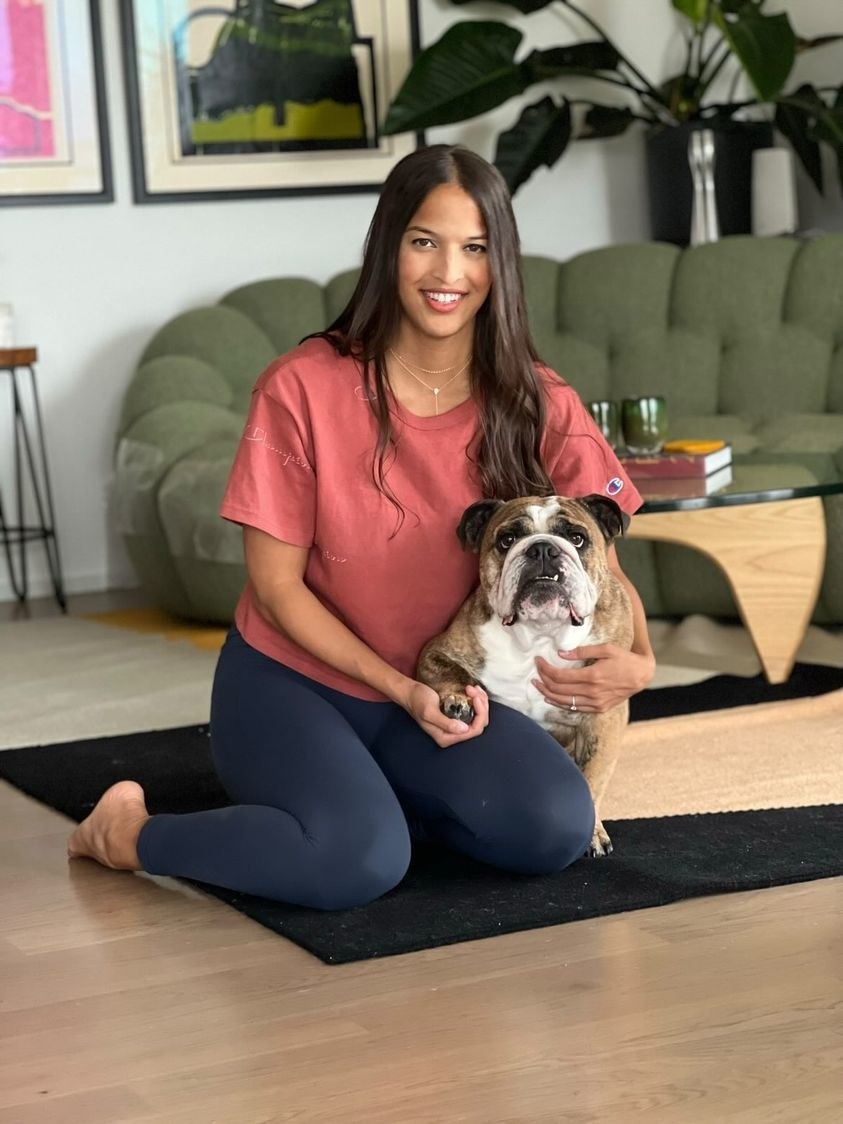 Woman with a dog in a home