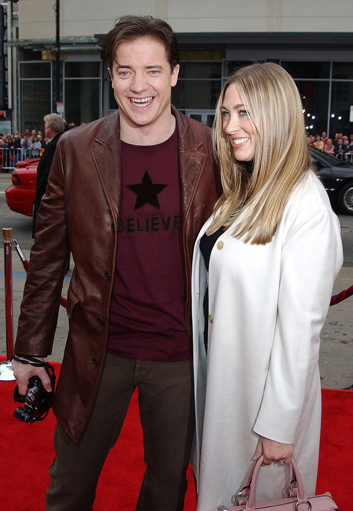 Brendan and Afton smiling on the red carpet