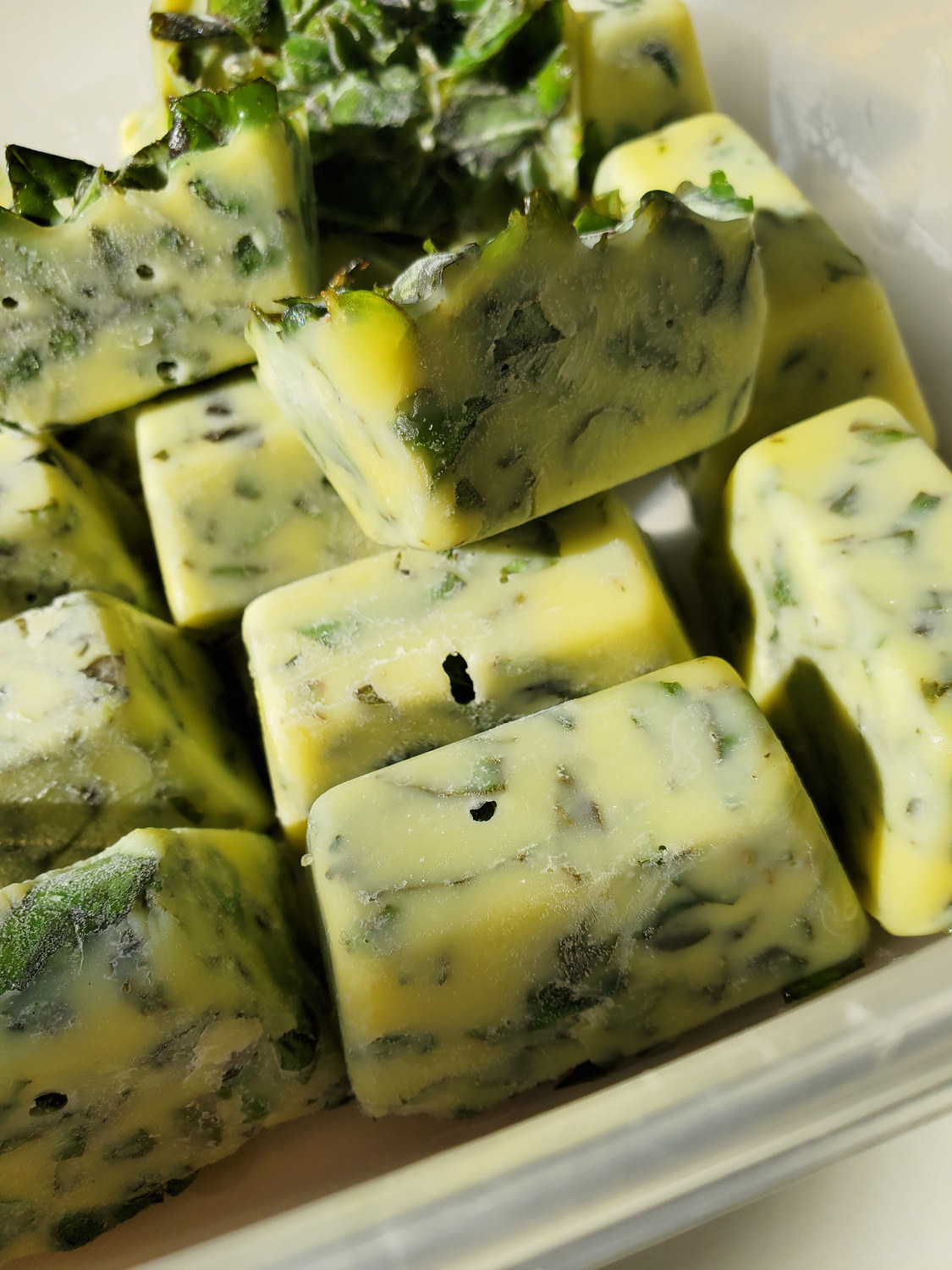 Basil and olive oil frozen cubes.