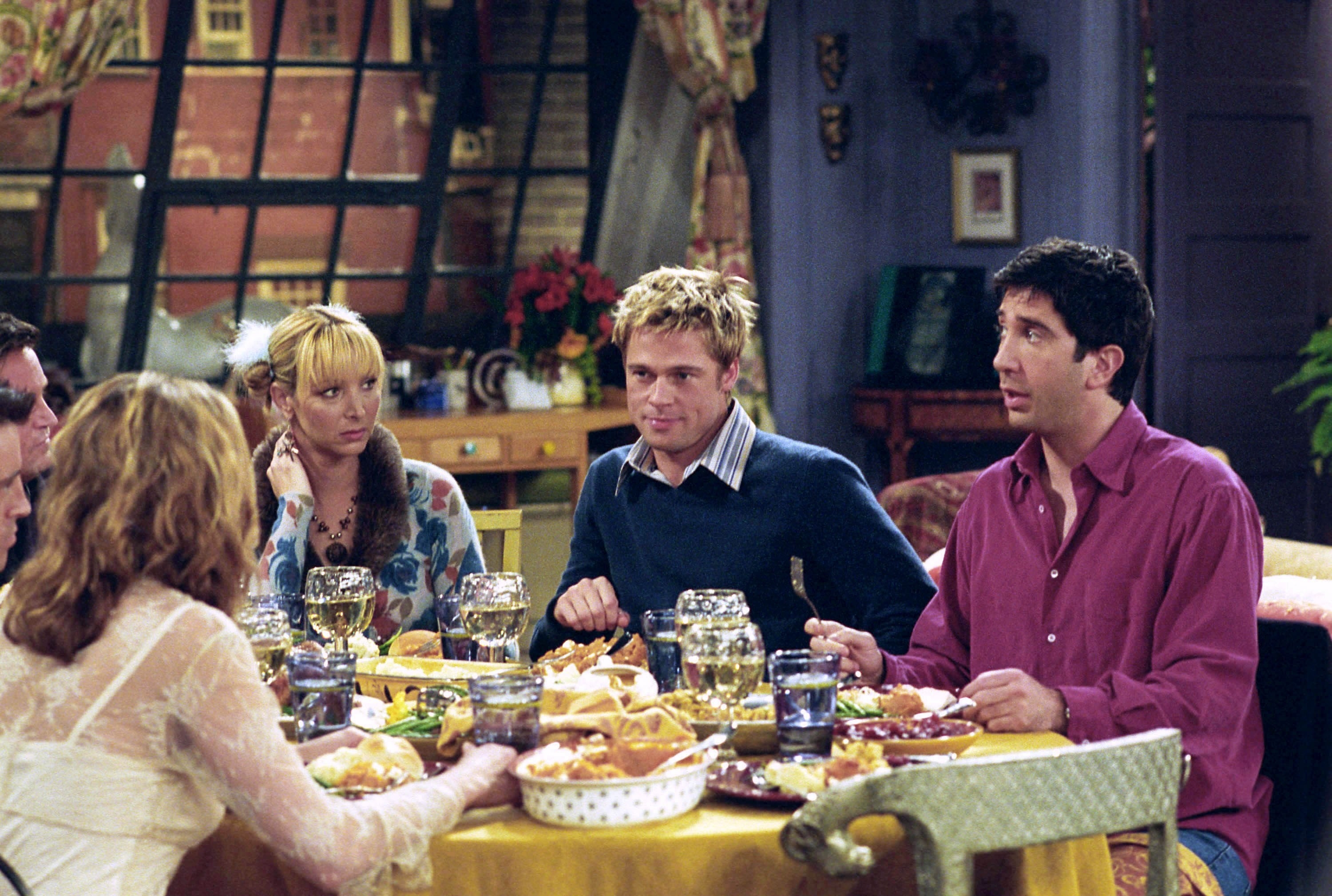 Jennifer Aniston as Rachel, Lisa Kudrow as Phoebe, Brad Pitt as Will, and David Schwimmer as Ross act in a scene from the &quot;Friends&quot; episode, &quot;The One With The Rumor&quot;