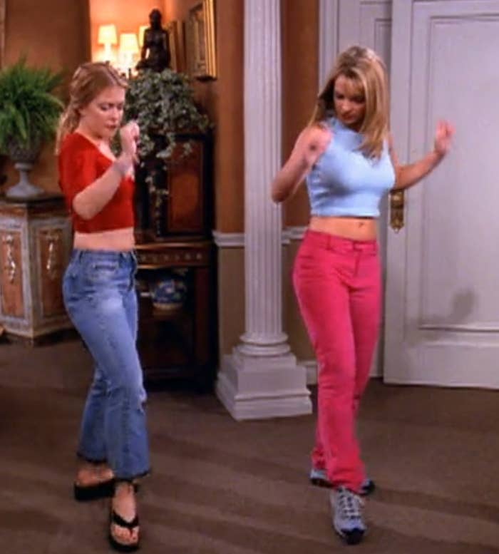 Melissa Joan Hart as Sabrina Spellman dances with Britney Spears