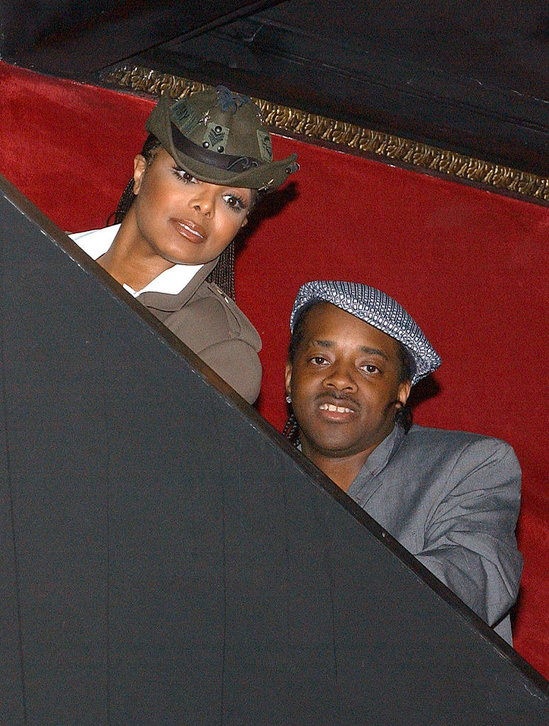 Janet and Jermaine wearing hats
