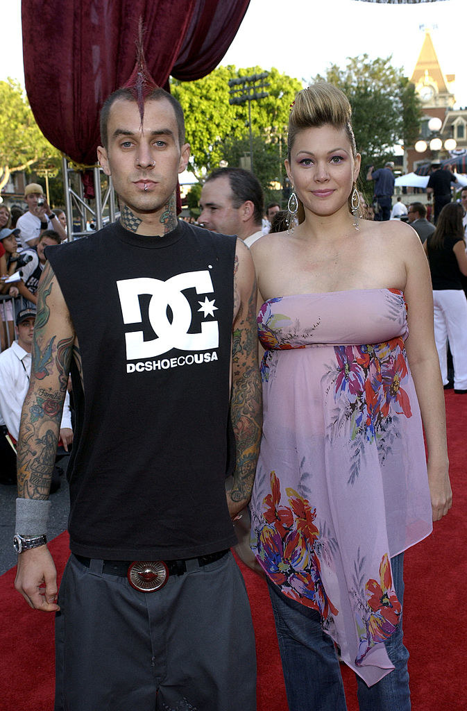 Travis and Shanna, both with tattoos, on the red carpet