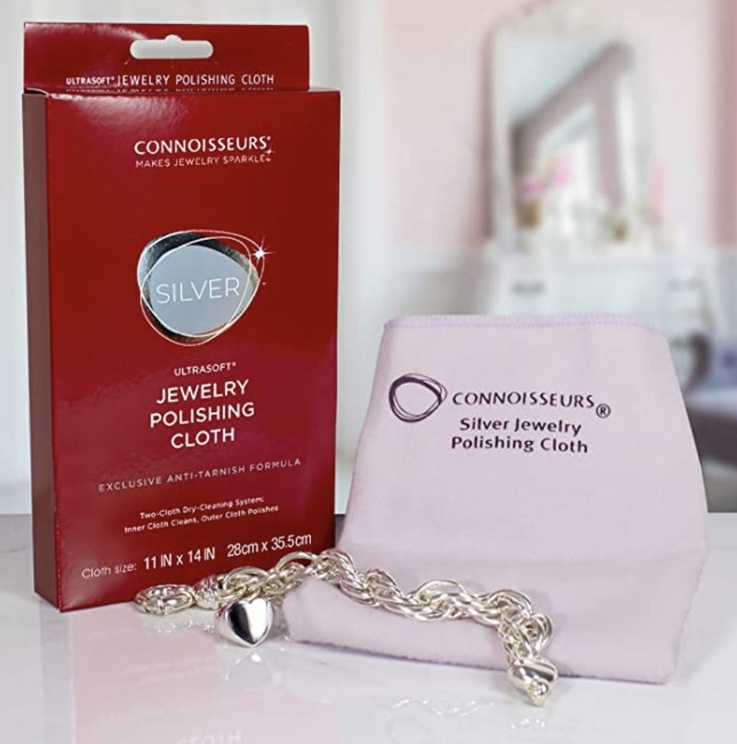 the cloth with the packaging and a silver bracelet