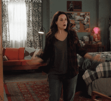 a gif of the character Stevie in &quot;Schitt&#x27;s Creek&quot; throwing up her hand and saying &quot;What took you so long?&quot;