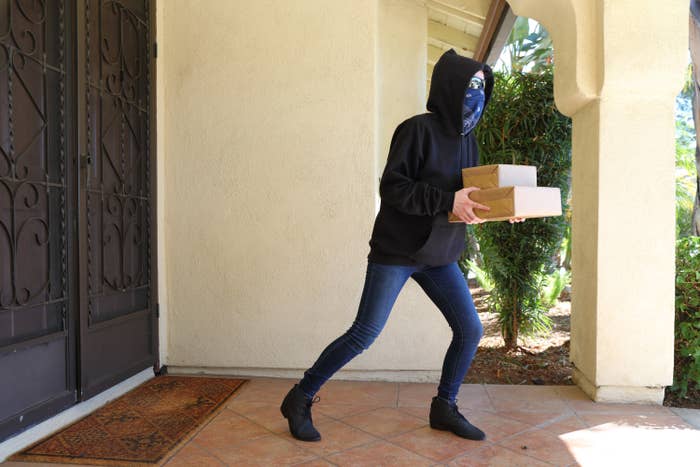 thief running away with packages