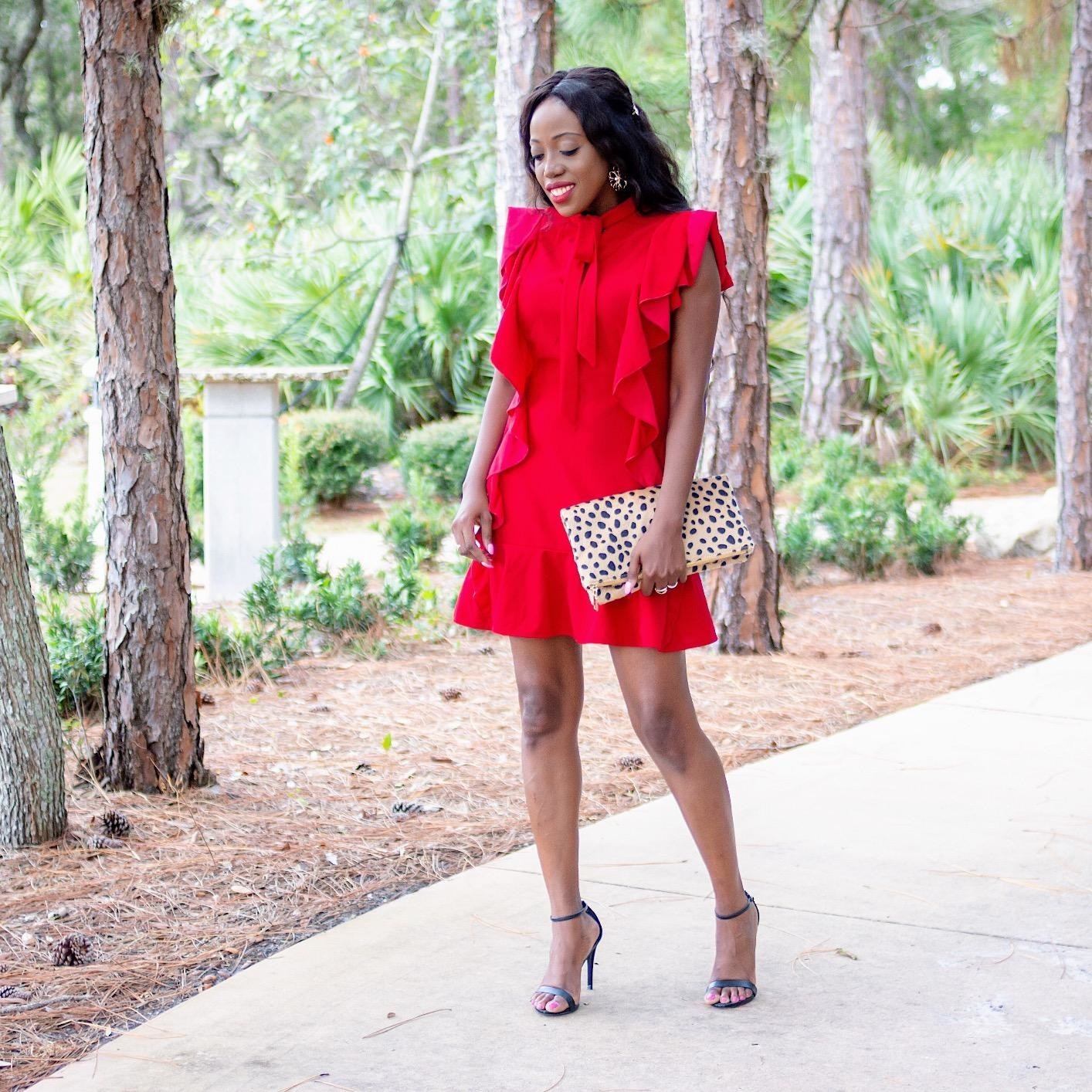 Reviewer wearing the red ruffle dress