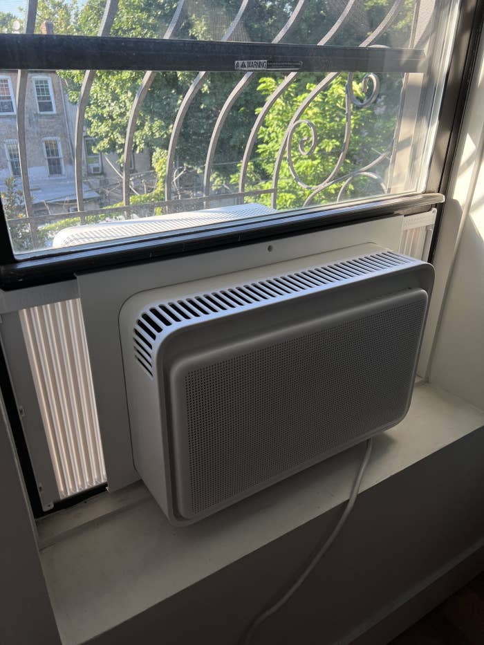 the ac unit in a windowsill