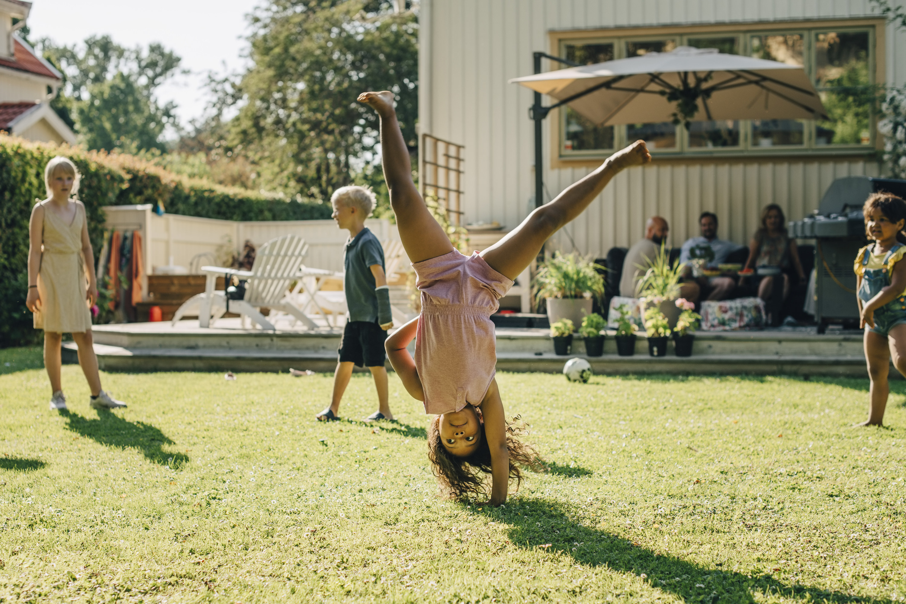 kids playing in a backyard