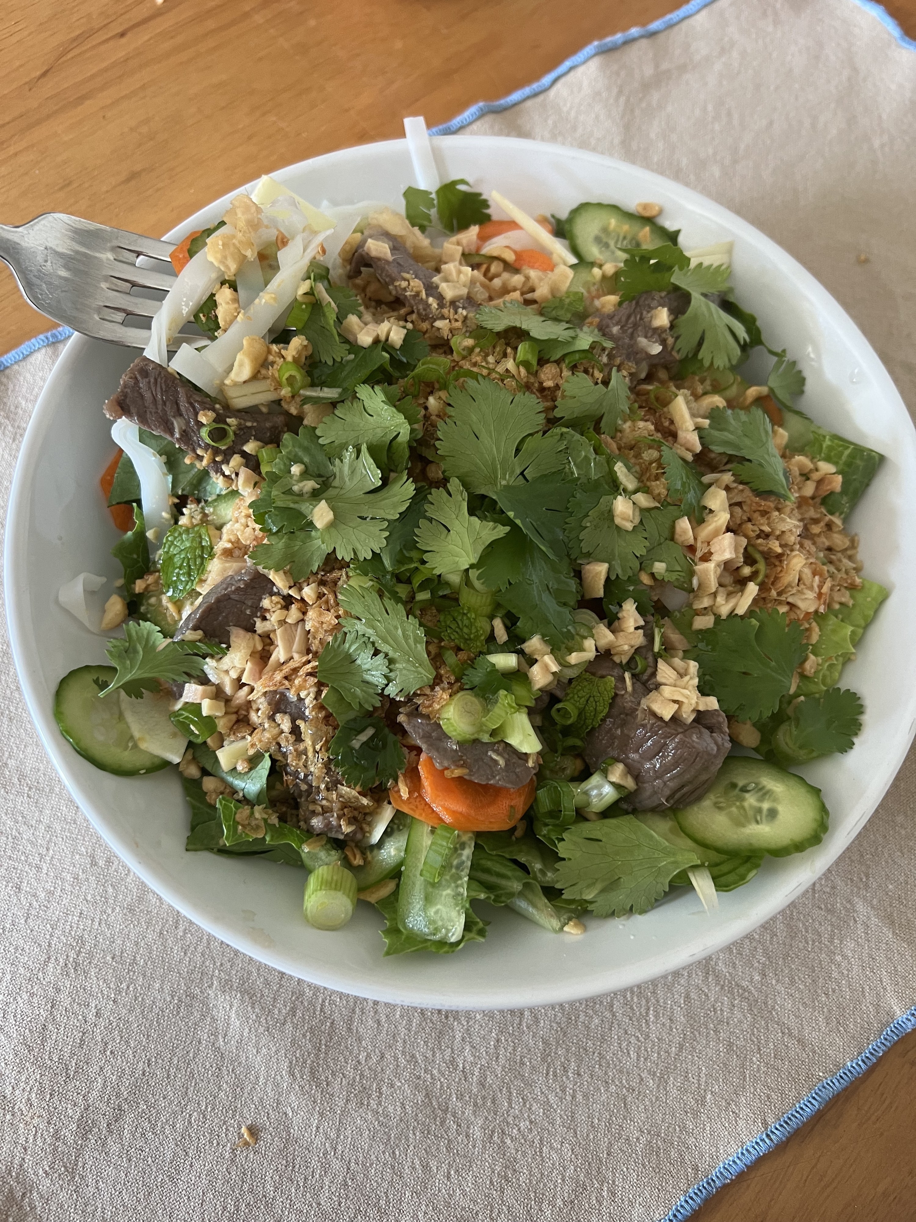 salad with meat herbs and noodles