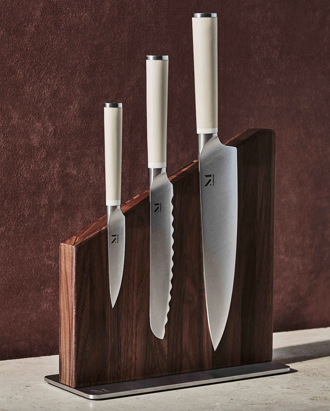 image of the knives in their wooden holder
