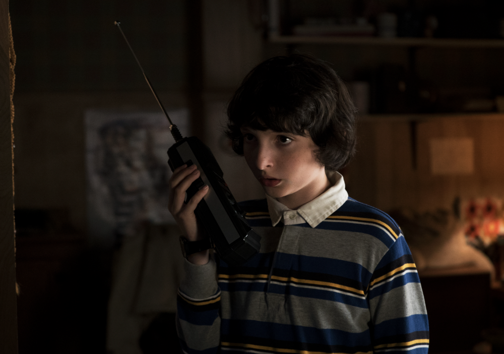 An episode still of Mike with a walkie talkie