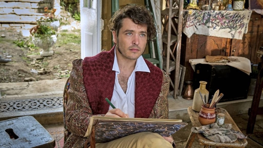 Alexander Vlahos as Charles Lockhart sitting and sketching on a pad