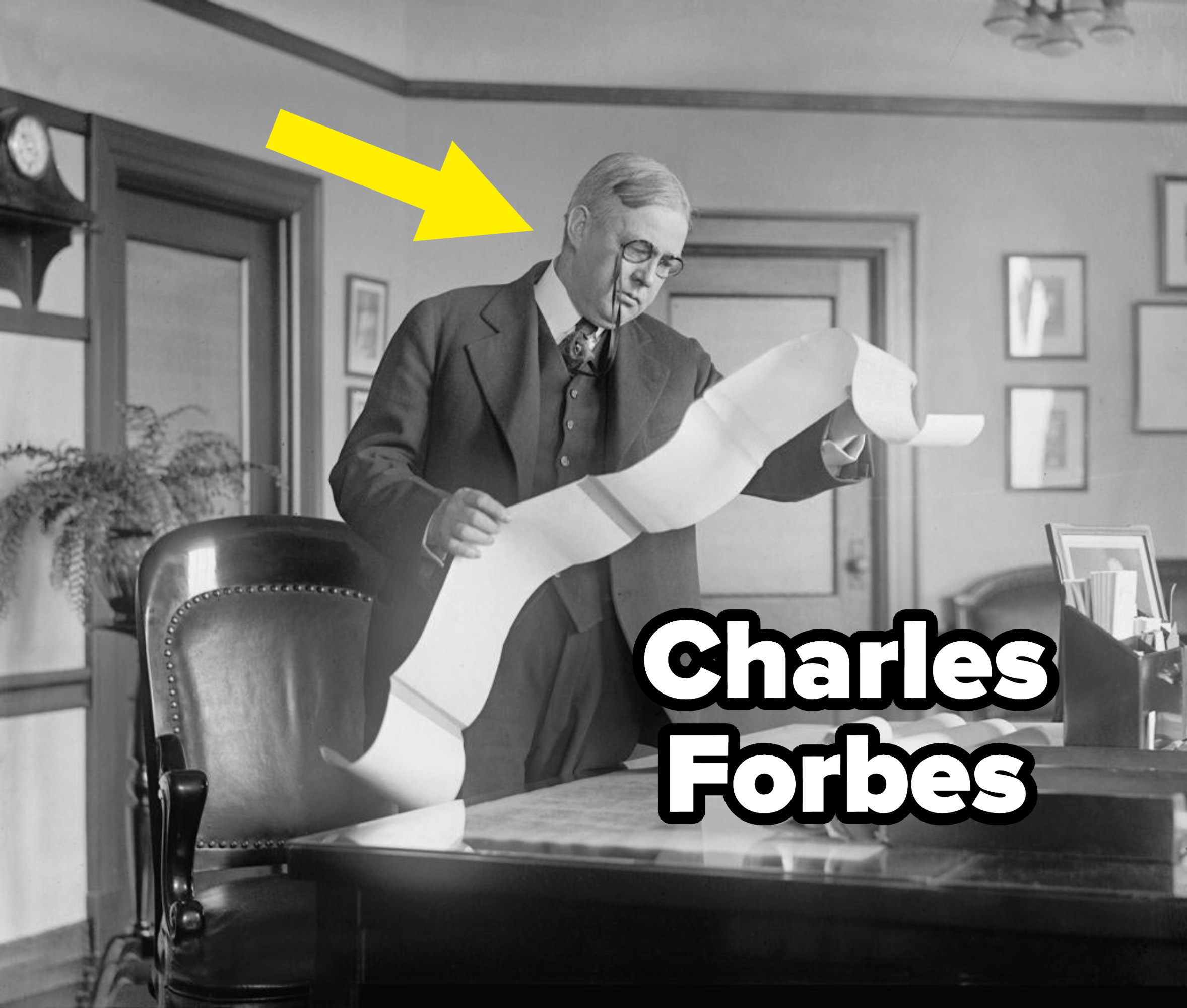 A picture of a monocle-wearing Charles Forbes reading a very long piece of paper