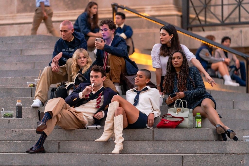 teenagers sitting on steps