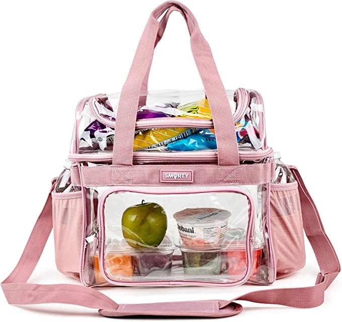 Pink clear lunch box filled with food