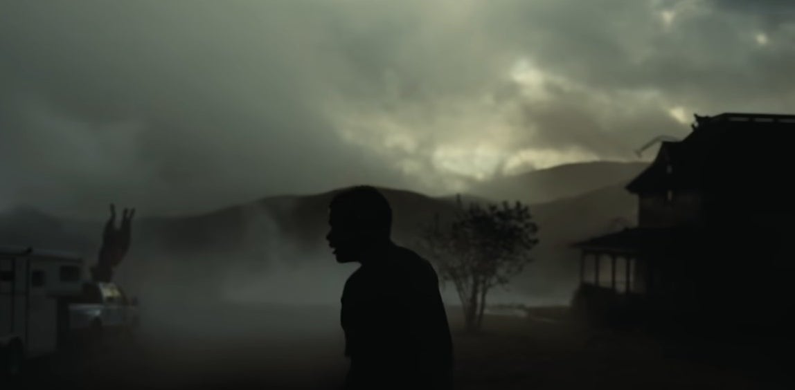 OJ walking through the foggy and gray Haywood Ranch in &quot;Nope&quot;