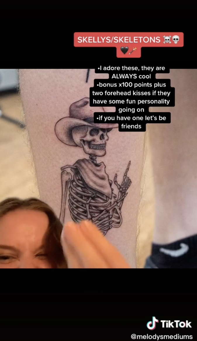 A screengrab from a TikTok by urtattoomommy sharing that skeleton tattoos are a green flag