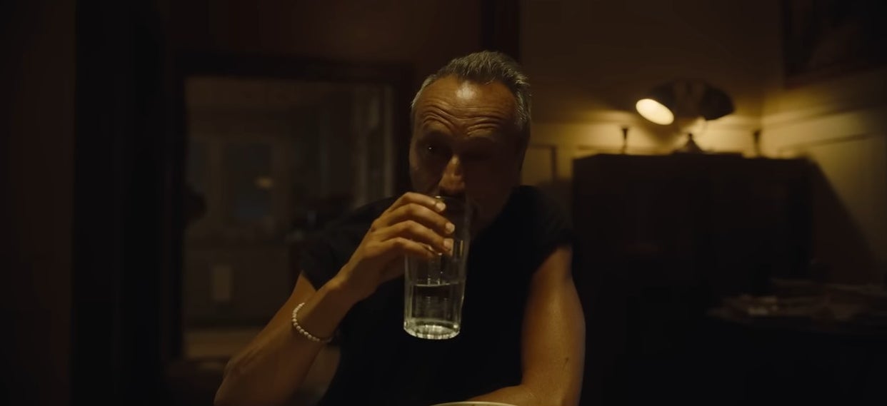 Antlers drinking a glass of water in "Nope"