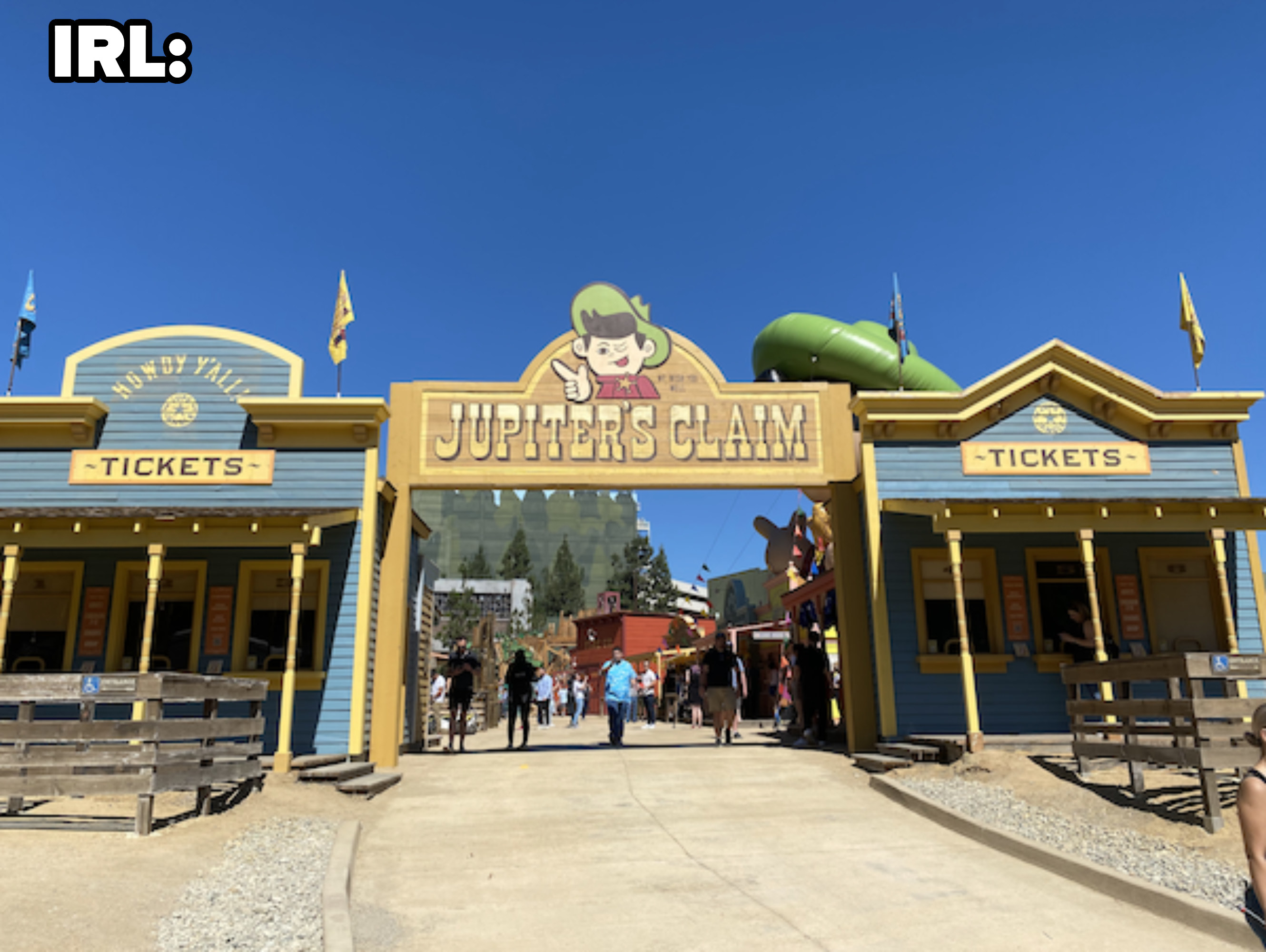 A photo of the set in real life, with the entrance looking very similar, including the same sign and giant inflatable mascot