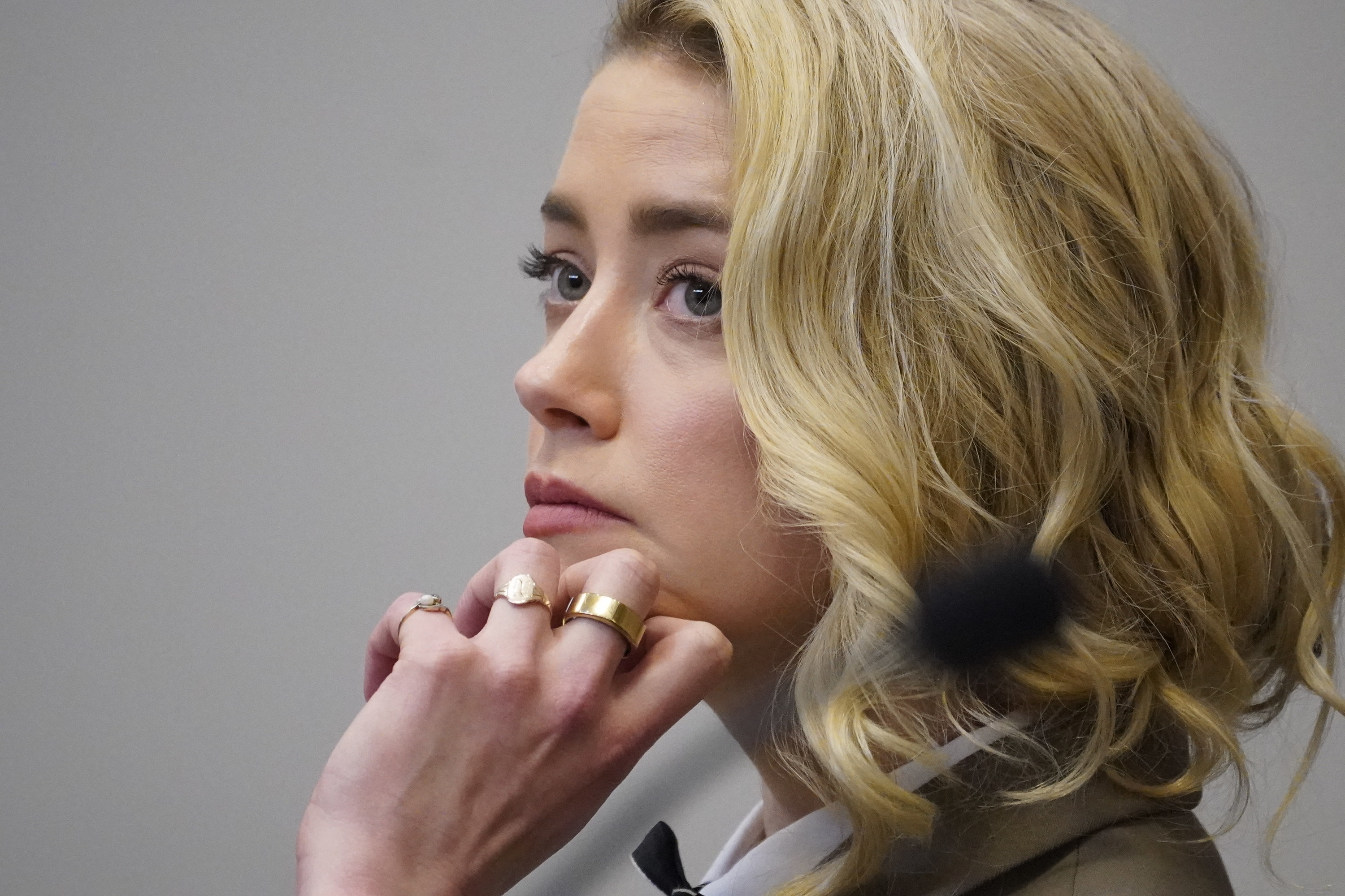 Amber Heard seen listening in the courtroom at the Fairfax County Circuit Courthouse in Fairfax, Virginia, on May 23, 2022.