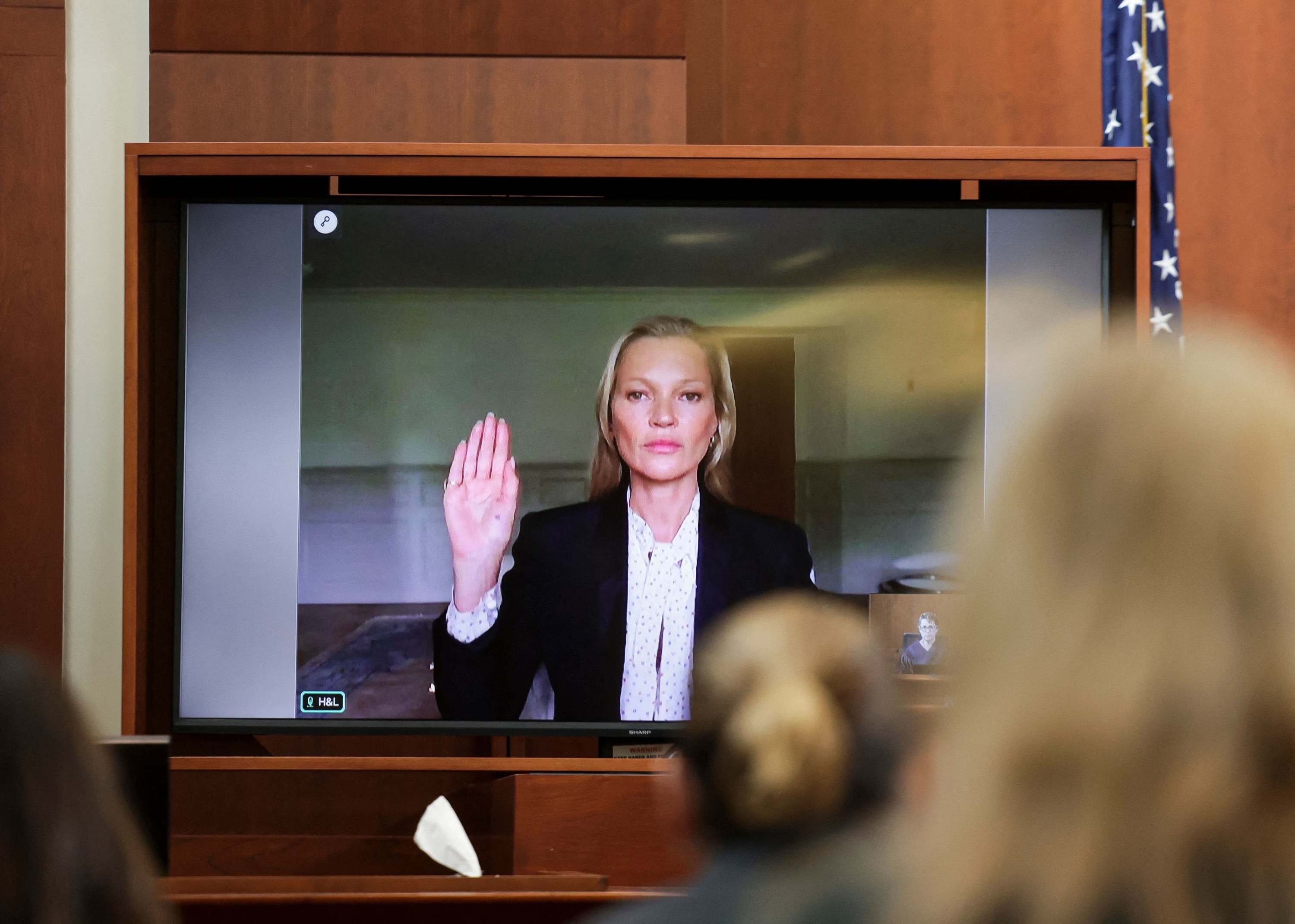 Kate Moss is sworn in via video link at the Fairfax County Circuit Courthouse in Fairfax, Virginia, on May 25, 2022