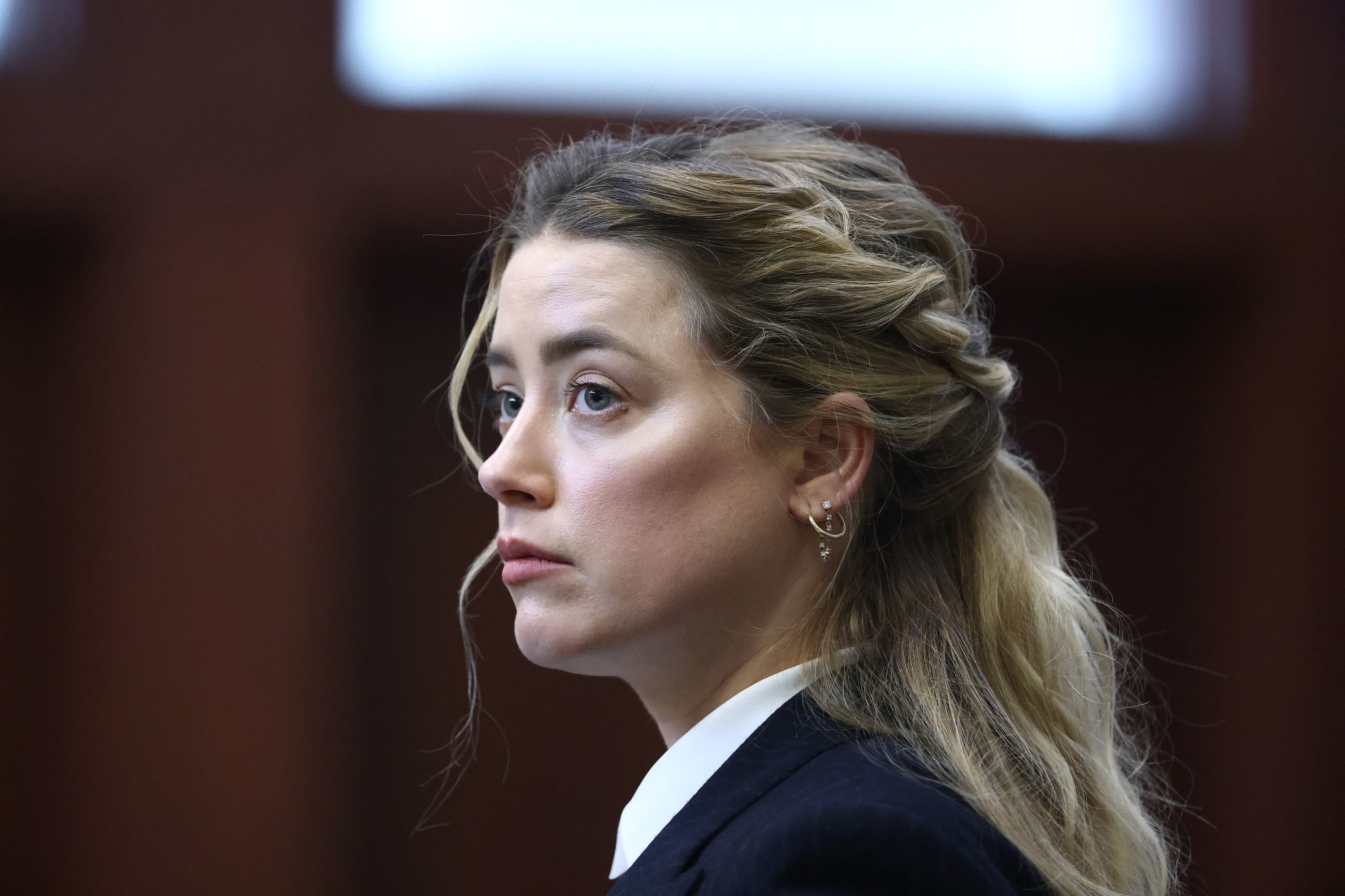 Amber Heard attends the defamation trial against her at the Fairfax County Circuit Courthouse in Fairfax, Virginia, April 21, 2022.