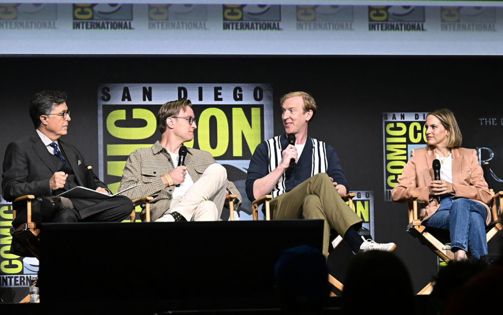 Stephen Colbert, JD Payne, Patrick McKay, and Lindsey Weber speak onstage at The Lord of the Rings: The Rings of Power panel in Hall H at the 2022 Comic-Con International