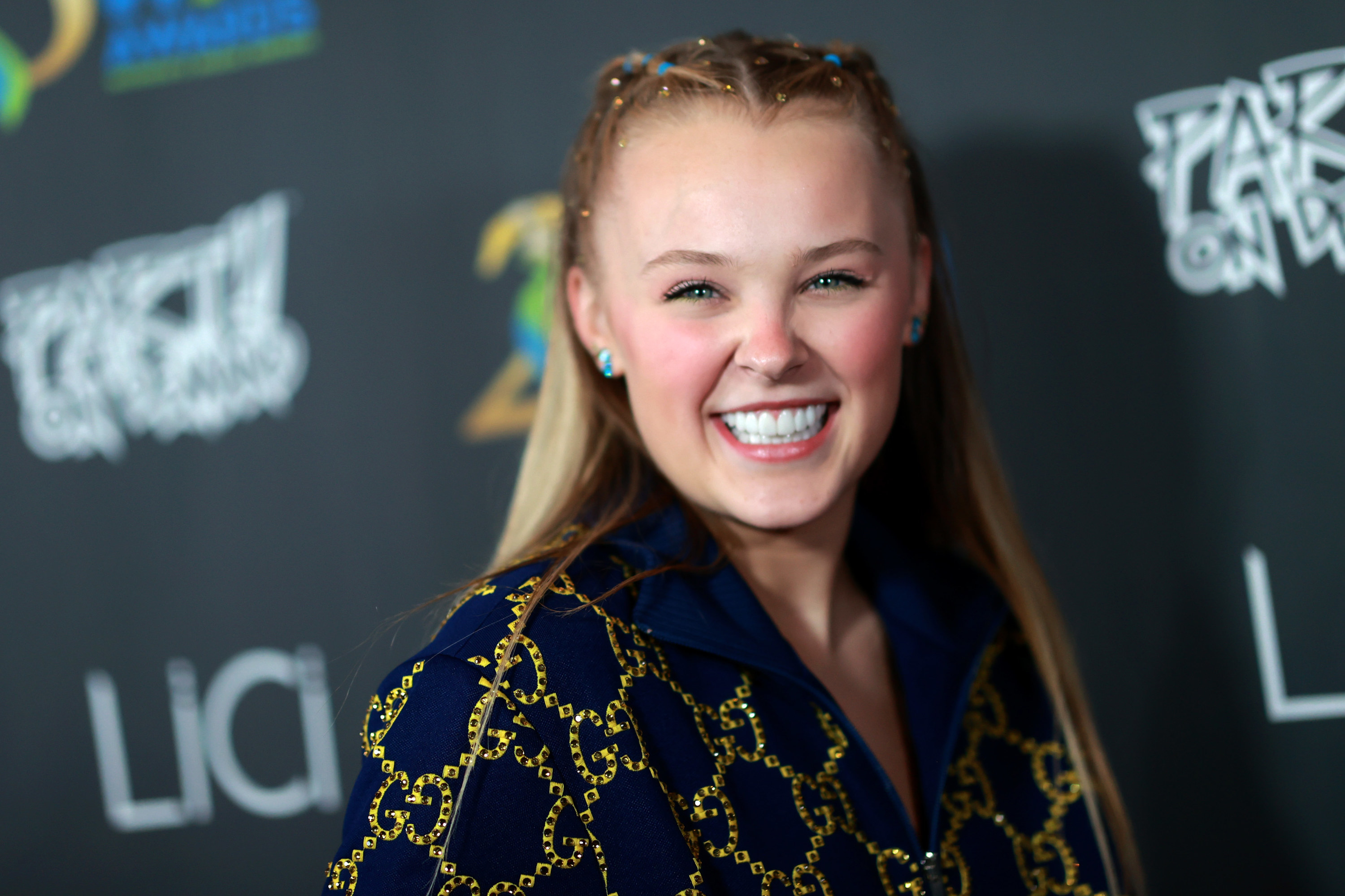 A close-up of JoJo smiling on the red carpet