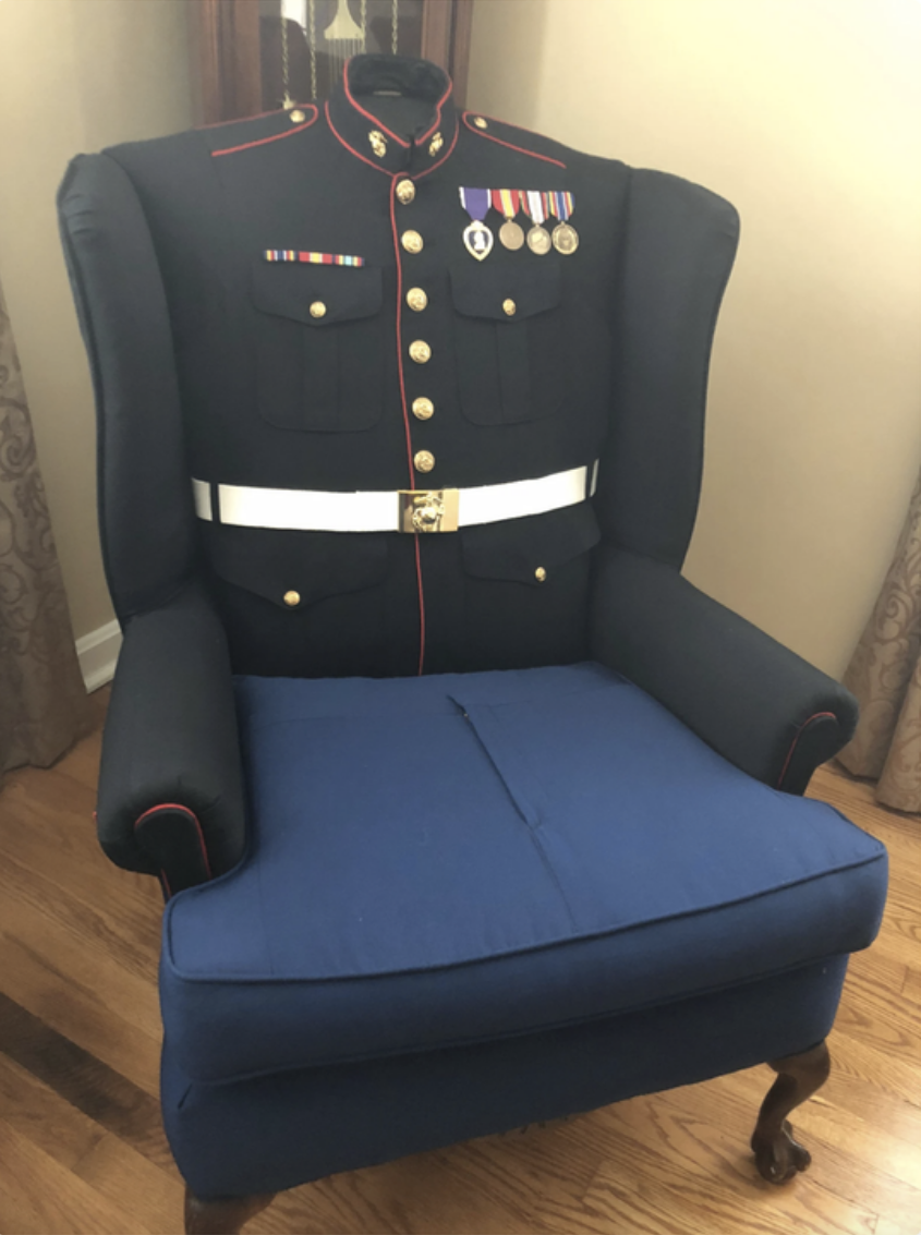 a chair with a Marine uniform sewed into it