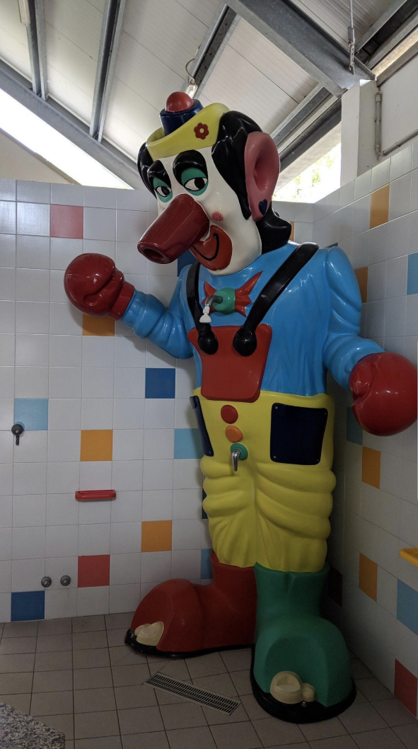 a shower with a clown design