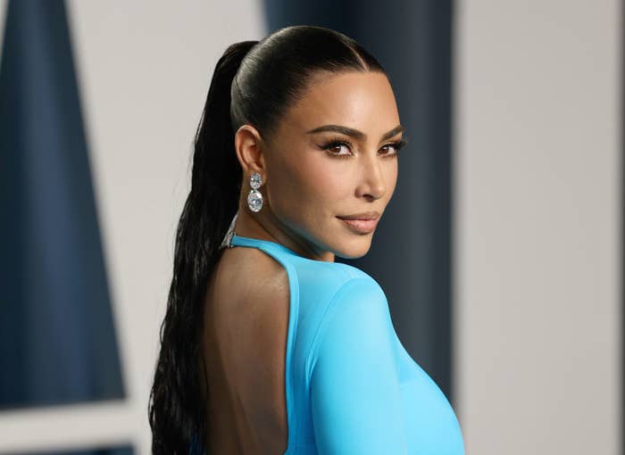 Kim Kardashian poses at the 2022 Vanity Fair Oscar Party