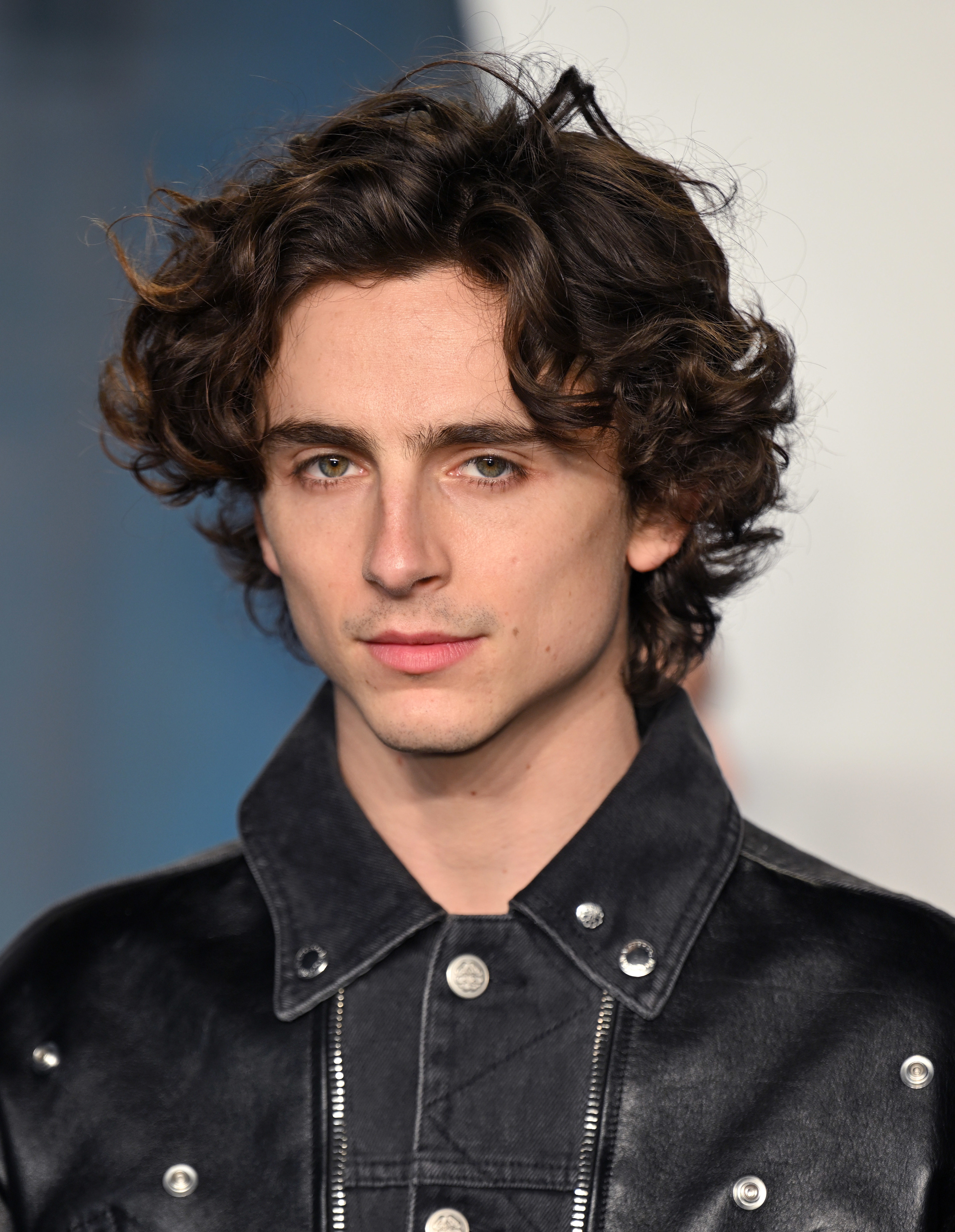 close up of Timothée in a leather jacket