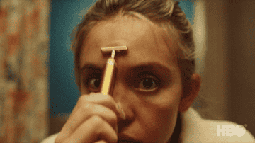 Gif of Sydney Sweeney in &quot;Euphoria&quot; aggressively using multiple skincare tools on their face